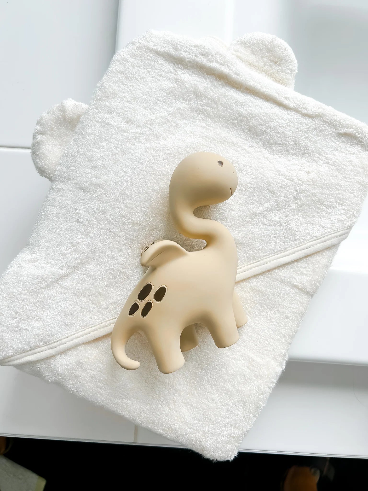 Eco-friendly natural rubber baby teether shaped like a dinosaur dragon