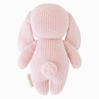 Back view of Cuddle+Kind baby bunny hand knit stuffed toy showing long ears and knit texture
