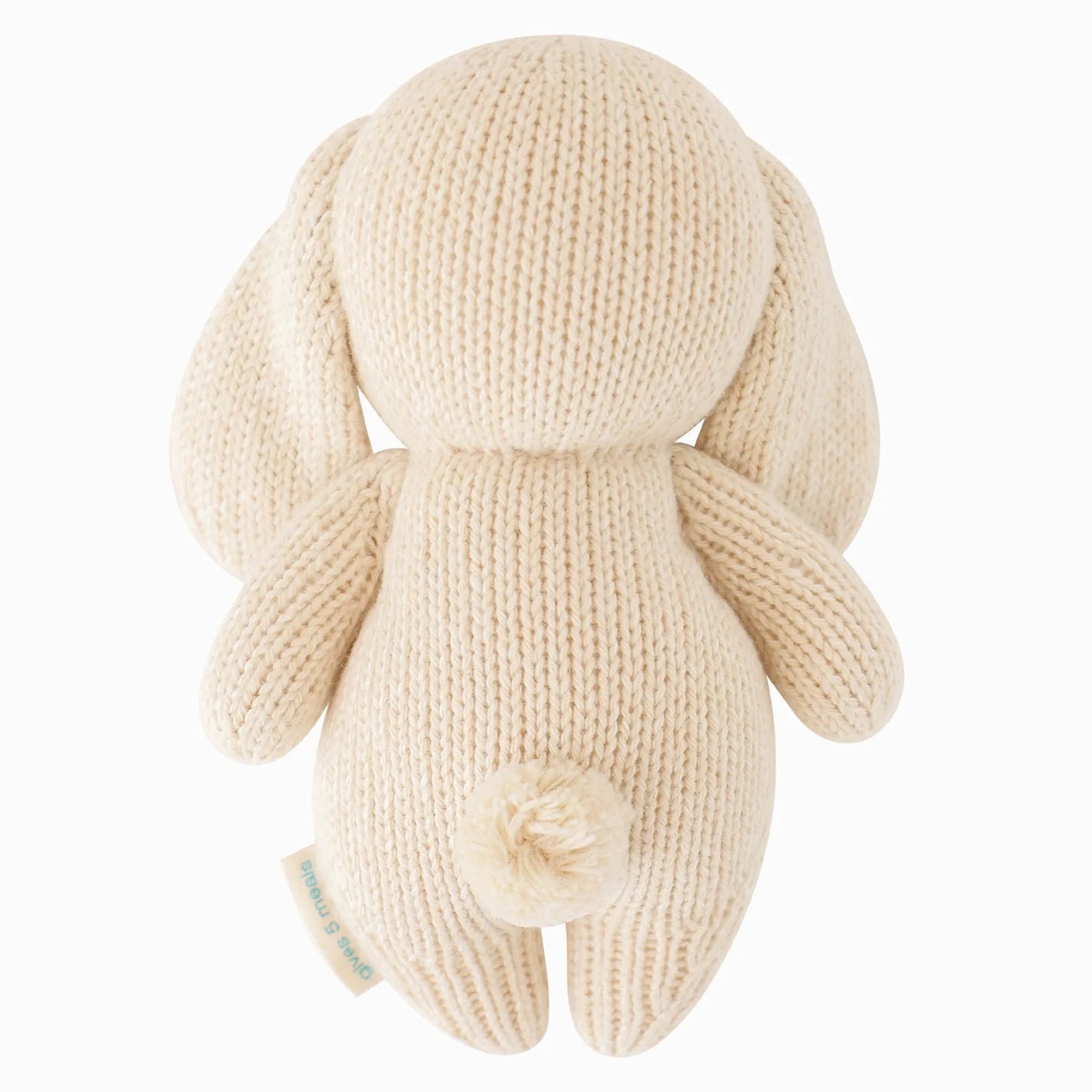 Back view of Cuddle+Kind baby bunny hand knit stuffed toy showing long floppy ears and knit texture