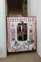 Kids café pretend play panel with reversible bakery design