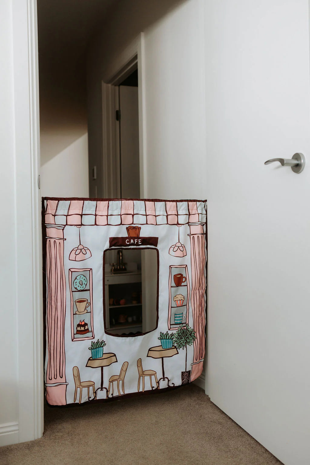Reversible café role play panel with bakery scene for imaginative play