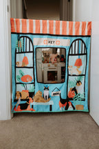 Kids reversible vet and pet shop play panel with doorway hanging setup