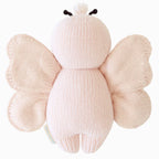 Back view of Cuddle+Kind baby butterfly hand knit stuffed toy showing layered wings and knit texture