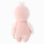 Back view of Cuddle+Kind baby flamingo hand knit stuffed toy showing wings and long legs