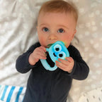 Glo Pals sensory rattle for babies with colour-changing lights and textured handle
