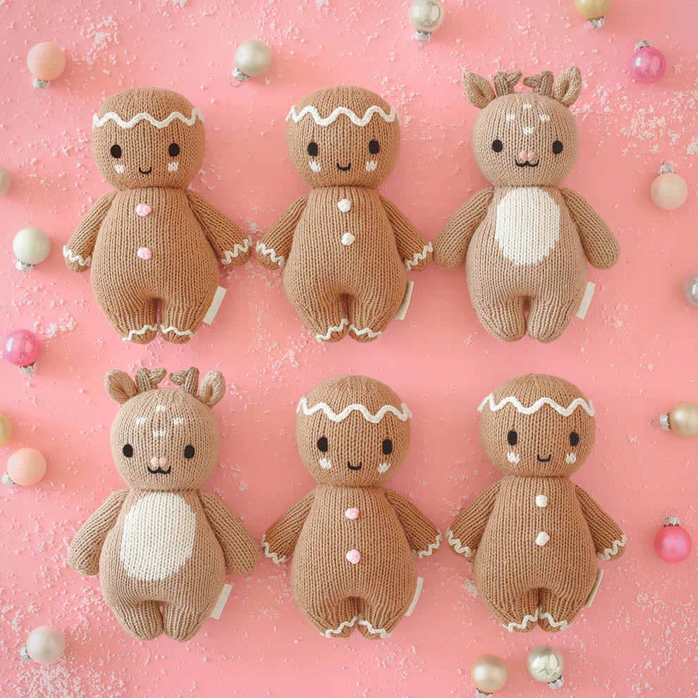Hand-knit gingerbread doll with white icing details