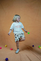 Organic cotton children's tee with reversible white and sugar colourways