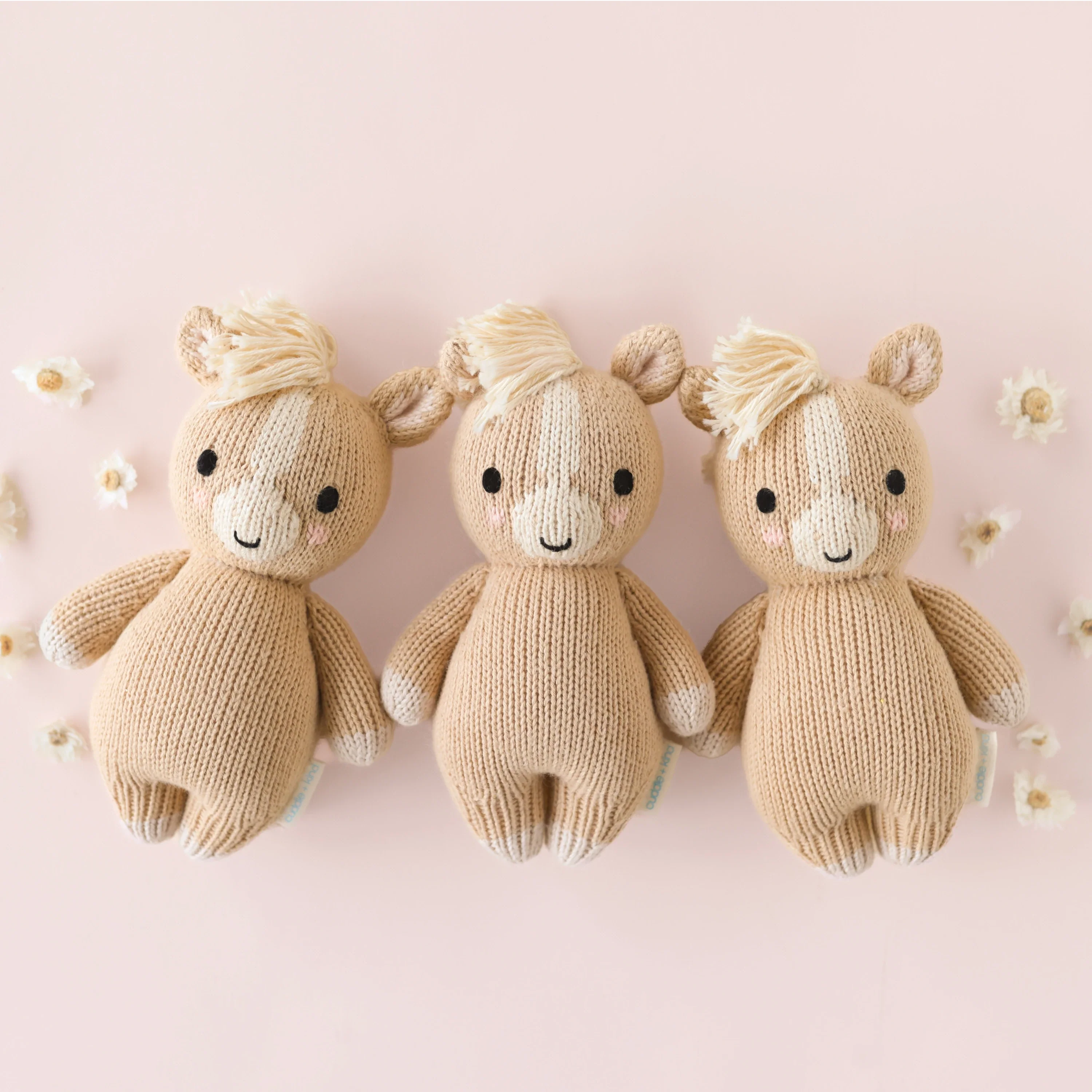 Cuddle+Kind baby pony knit plush toy styled with matching hand knit baby animals