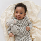 Baby cuddling Cuddle+Kind baby elephant soft knit plush toy