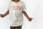 Reversible children's tee featuring two unique designs in one