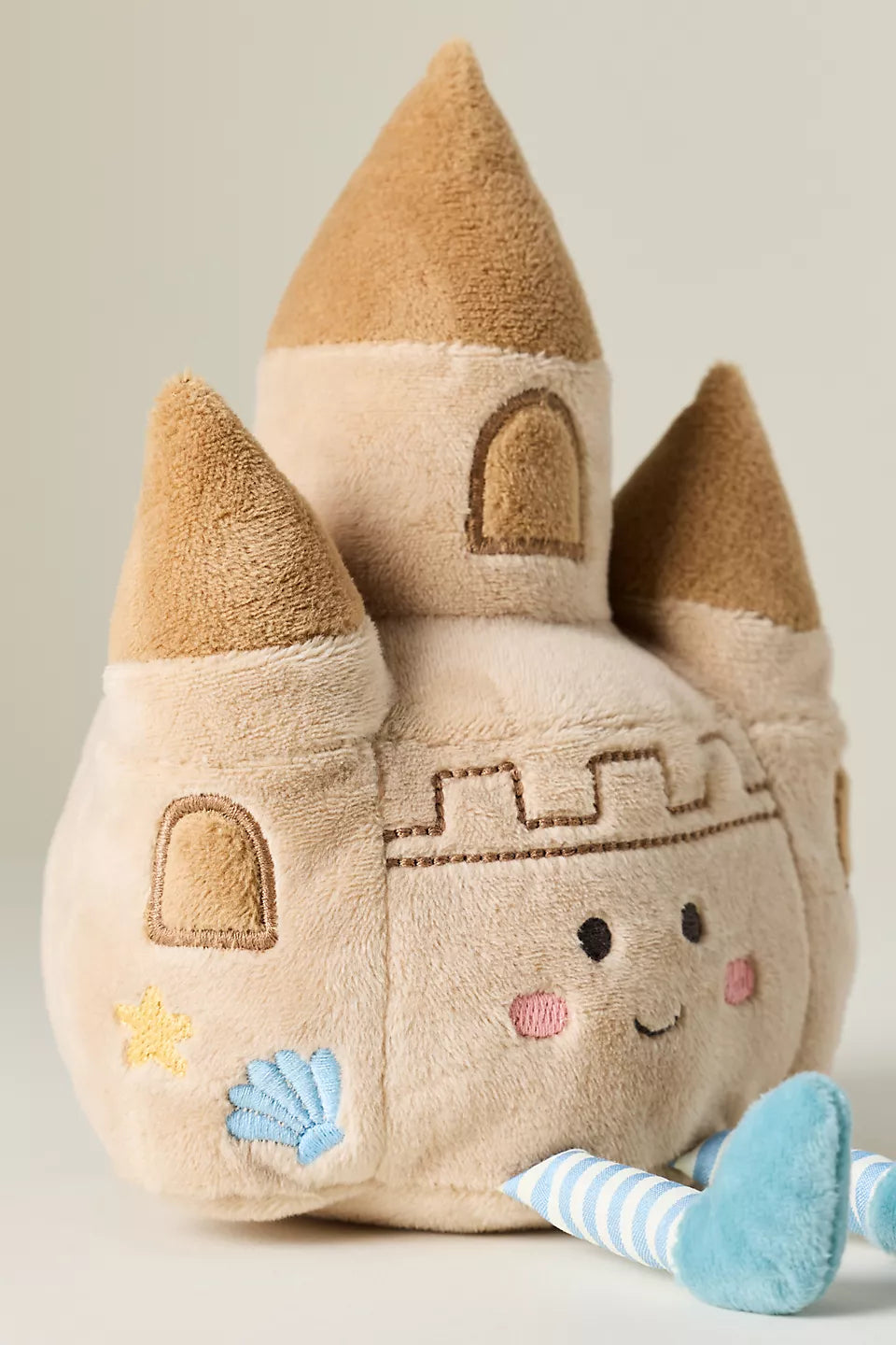 closer look at Sand Castle plush toy by Mon Ami, similar to sold out jellycat one, a soft beach-themed toy for babies and toddlers designed for comfort, play and everyday snuggles.