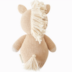 back view of Cuddle+Kind baby pony hand knit stuffed toy showing mane and tail details
