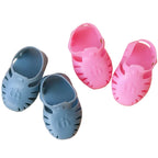 baby doll jelly sandal shoes for 34-38cm dolls. Fits Miniland, Minikane, Paola Reina and Mini Coletto doll, available in pink or bue by the brand tiny harlow