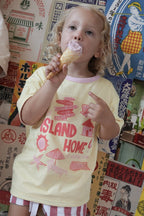 Reversible kids travel-themed t-shirt in pink and yellow by Lokal Folk