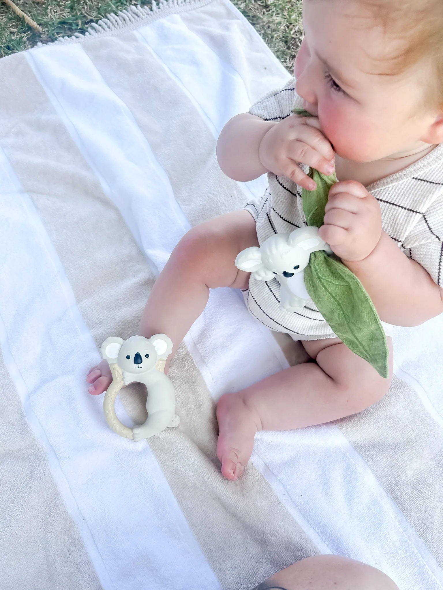 Multi-sensory baby teether with rattle and crinkle leaf by Winnie Parkes