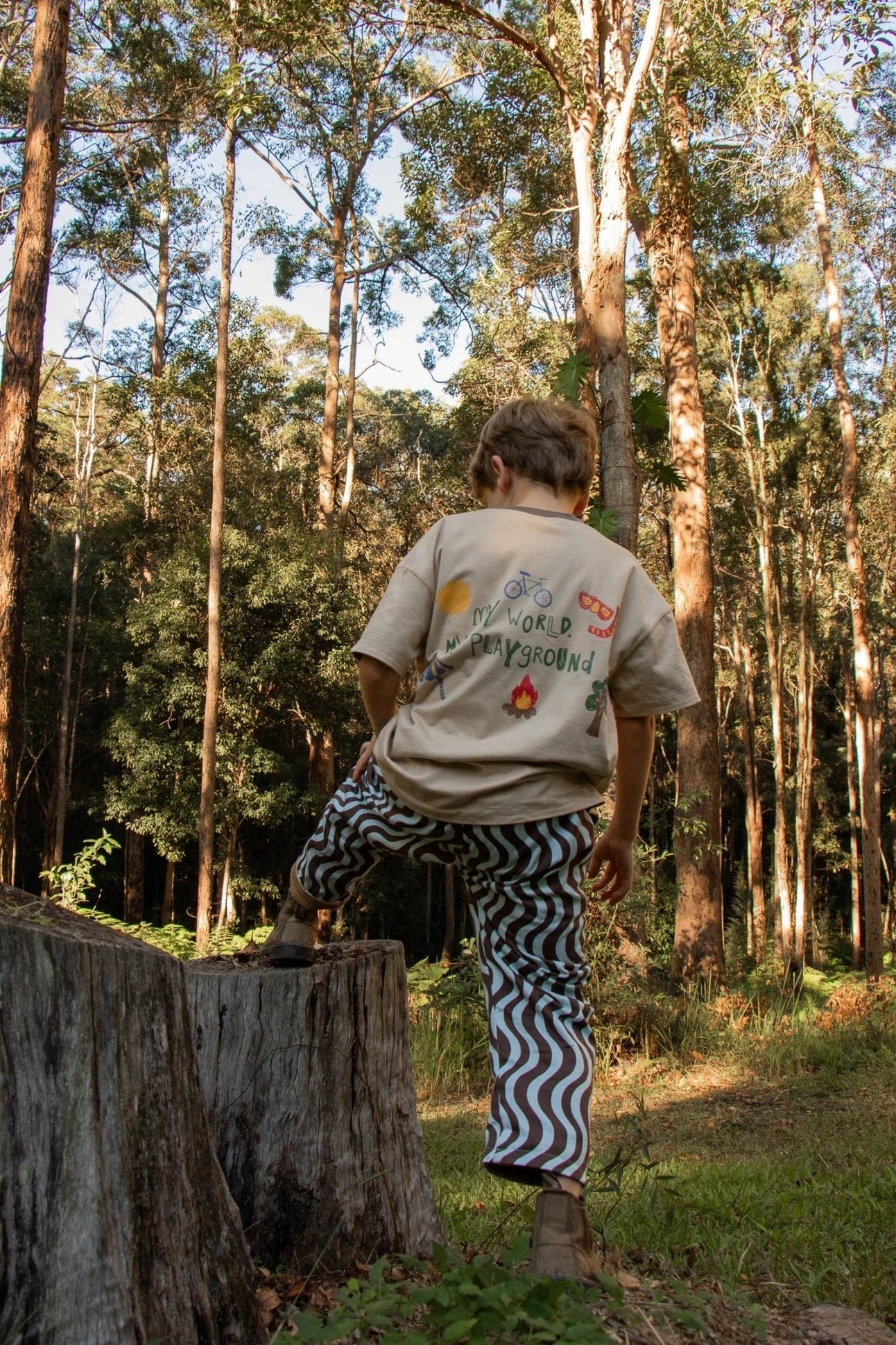Reversible children's tee with hand-drawn adventure-inspired artwork