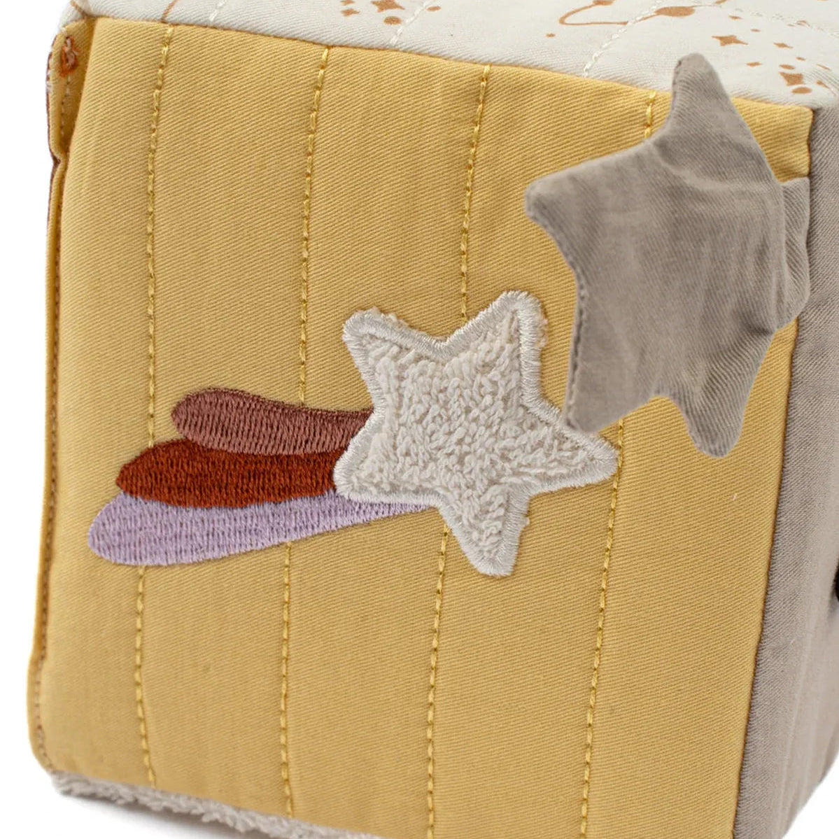 Baby sensory cube featuring colourful space-themed elements and tactile details