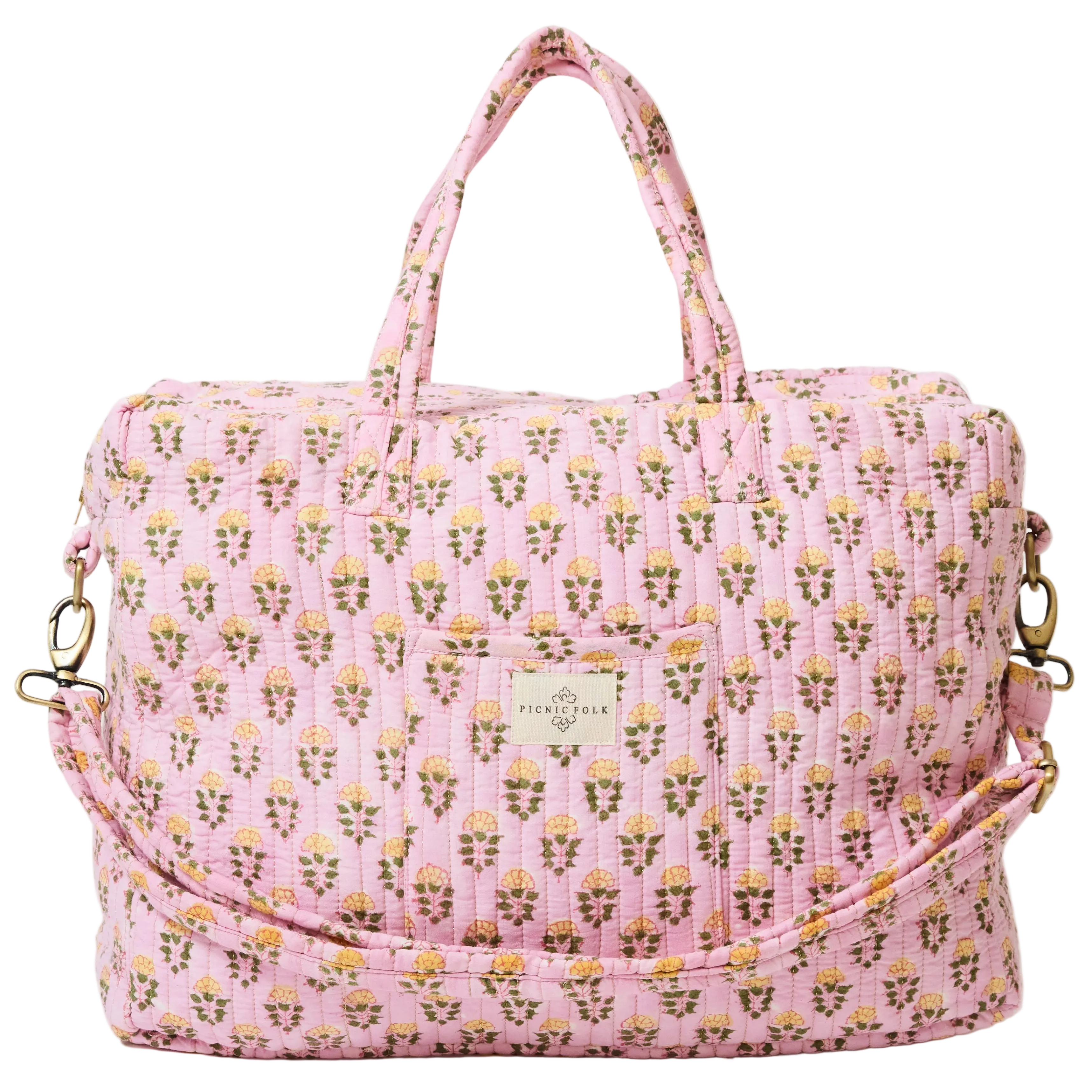 pink sunshine quilted weekender bag with floral print and handles