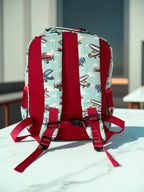 back view of Mini & Mum kids backpack with insulated interior for daycare and outings. can be personalised with childs name. this print is aviator wonders - blue sky with clouds and planes