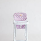 photoshoot of lilac daisy highchair for dolls made by tiny harlow
