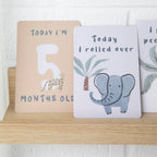 milestone cards by lively living to track babies age and milestones. great for photos and theme is wild safari. card pictured reads today i'm 5 months old, today i rolled over