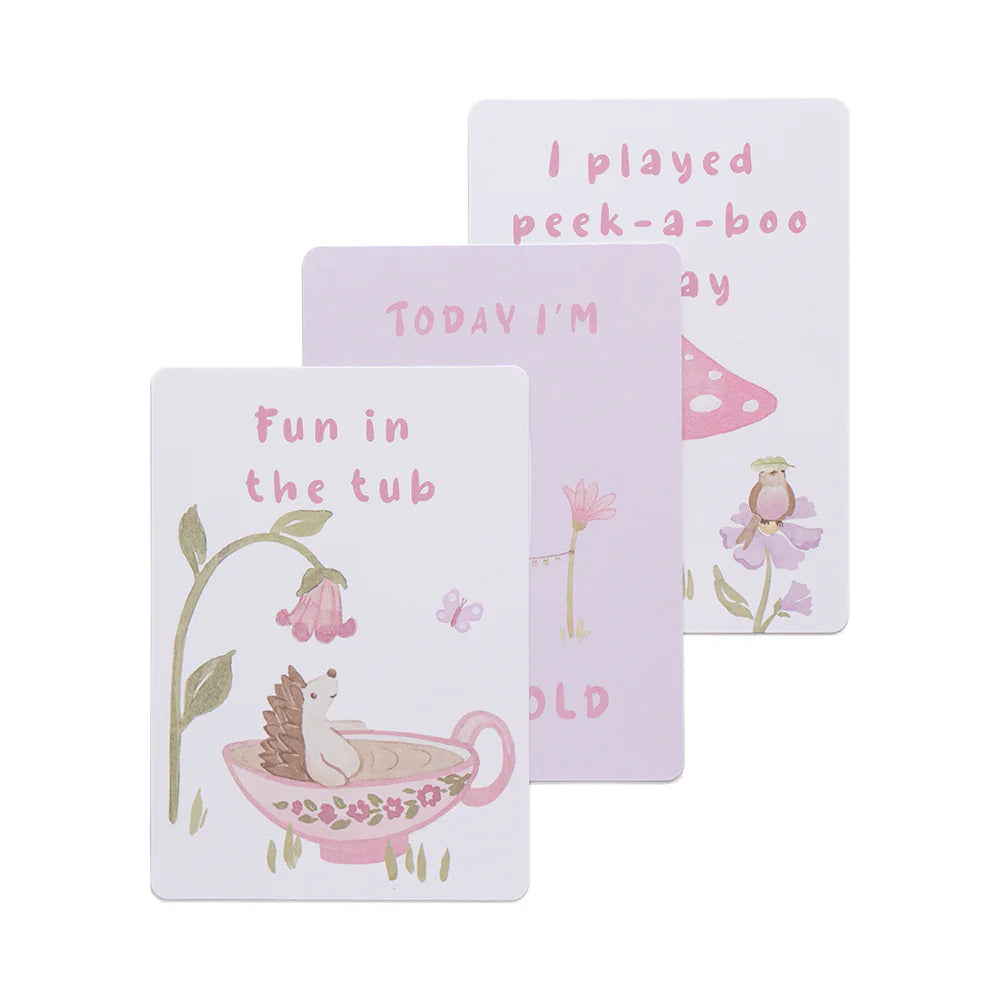 milestone cards by lively living to track babies age and milestones. great for photos and theme is whimsical wonderland. card pictured reads fun in the tub, today i'm blank years old, i played peek a boo today