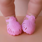 baby doll jelly sandal shoes for 34-38cm dolls. Fits Miniland, Minikane, Paola Reina and Mini Coletto doll, available in pink by the brand tiny harlow