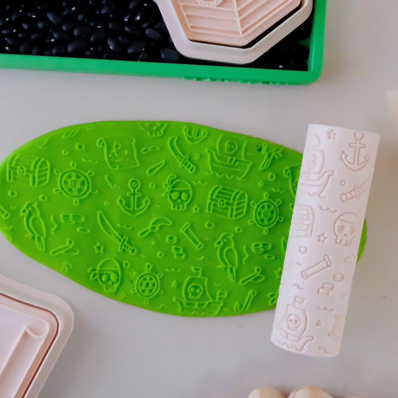 Image of eco textured dough roller designed with fun patterns and to be used with sensory like playdough or can be used for cooking dough. Textured roller is in the pattern pirate