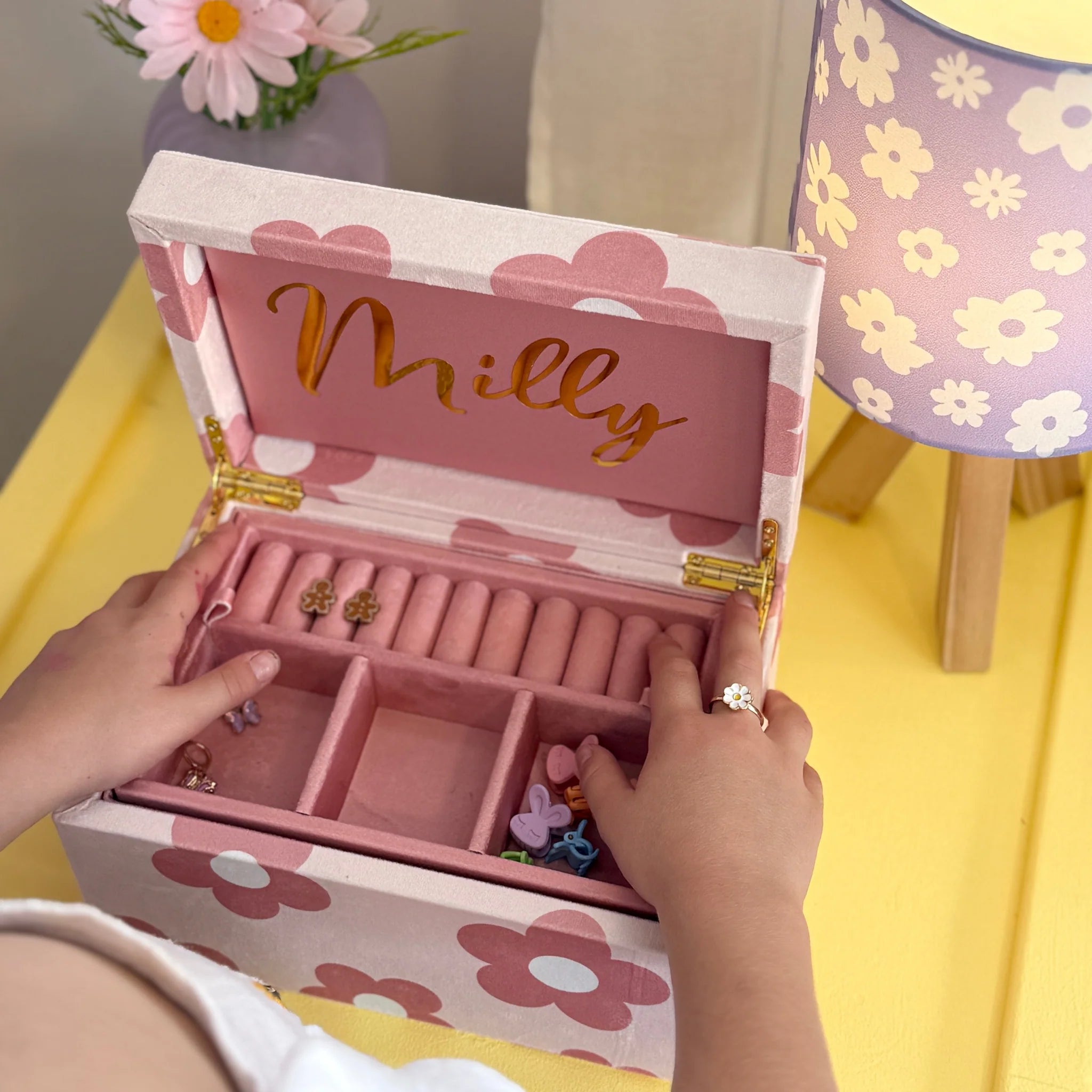 open jewellery box showing compartments and velvet lining