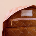 inside tag view of Fox & Fallow backpack for kids, perfect for school, daycare and everyday use. Spacious, practical and designed for little adventures. Personalisation of embroidery with name also available on bags in 2 placements. This print is peach check