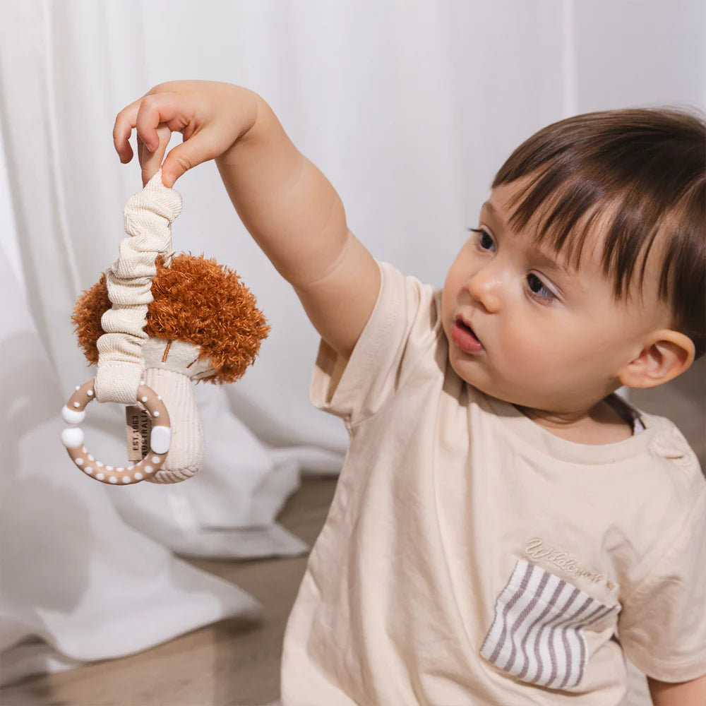 Child playing with Living Textiles mushroom and corn mini market baby toys