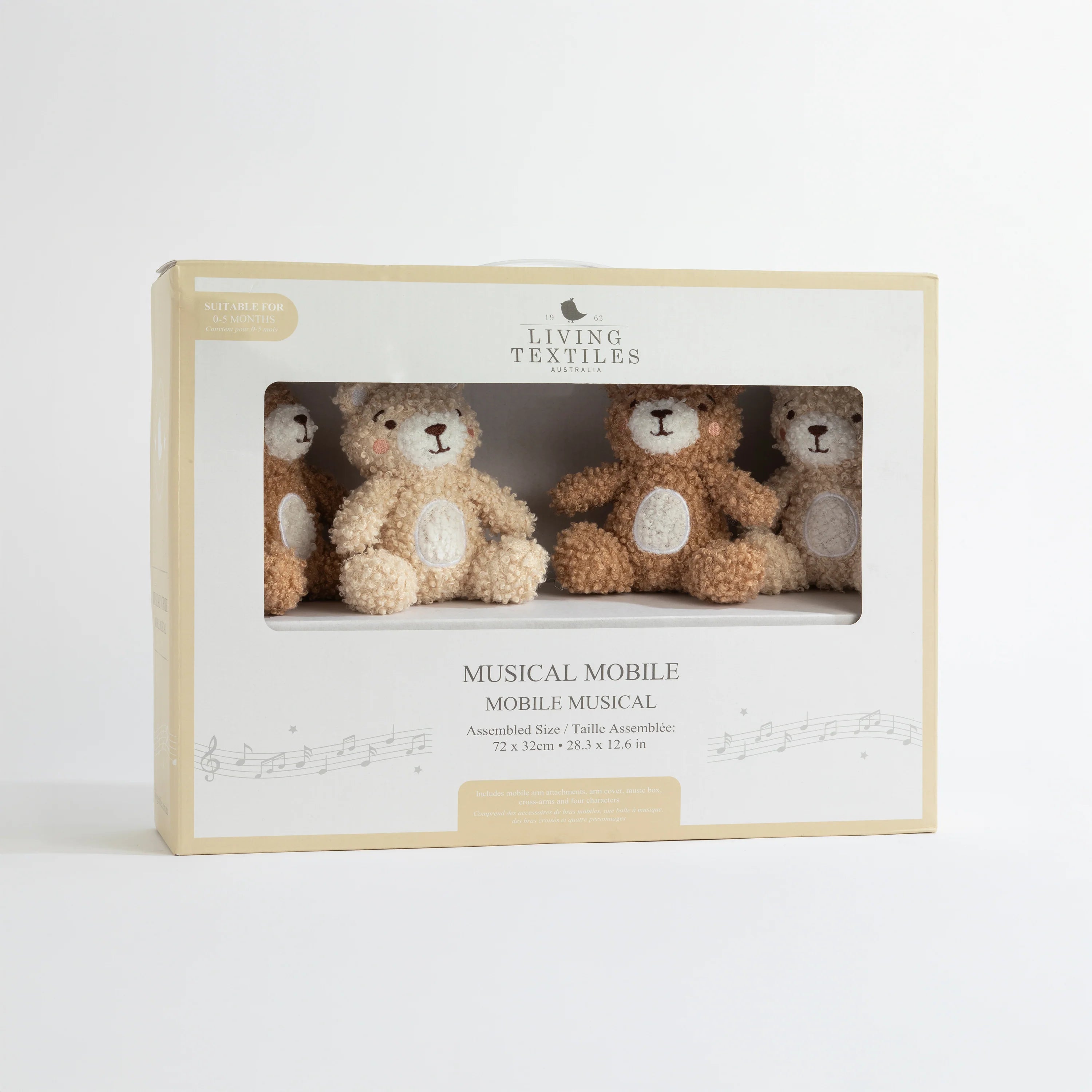 Living Textiles musical mobile packaging with teddy bear design on a white background