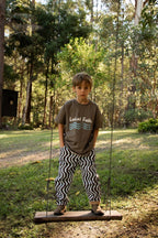 Child wearing My World My Playground reversible t-shirt by Lokal Folk