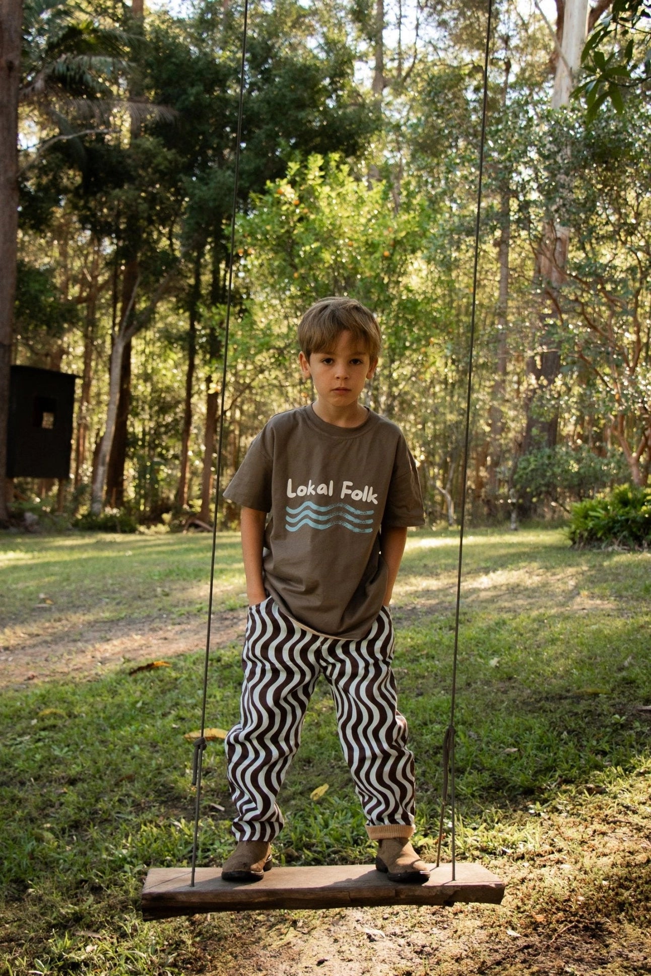 Child wearing My World My Playground reversible t-shirt by Lokal Folk