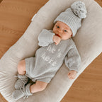 Baby boy knit announcement bundle with long sleeve romper booties and matching beanie