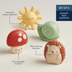 Set of 4 sensory bath squirters shaped like a sun, mushroom, snail, and hedgehog on a light background.