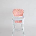 photoshoot of pink ducky highchair for dolls made by tiny harlow