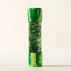 DIY dinosaur sensory calm down bottle by Jellystone Designs with reusable sensory craft kit