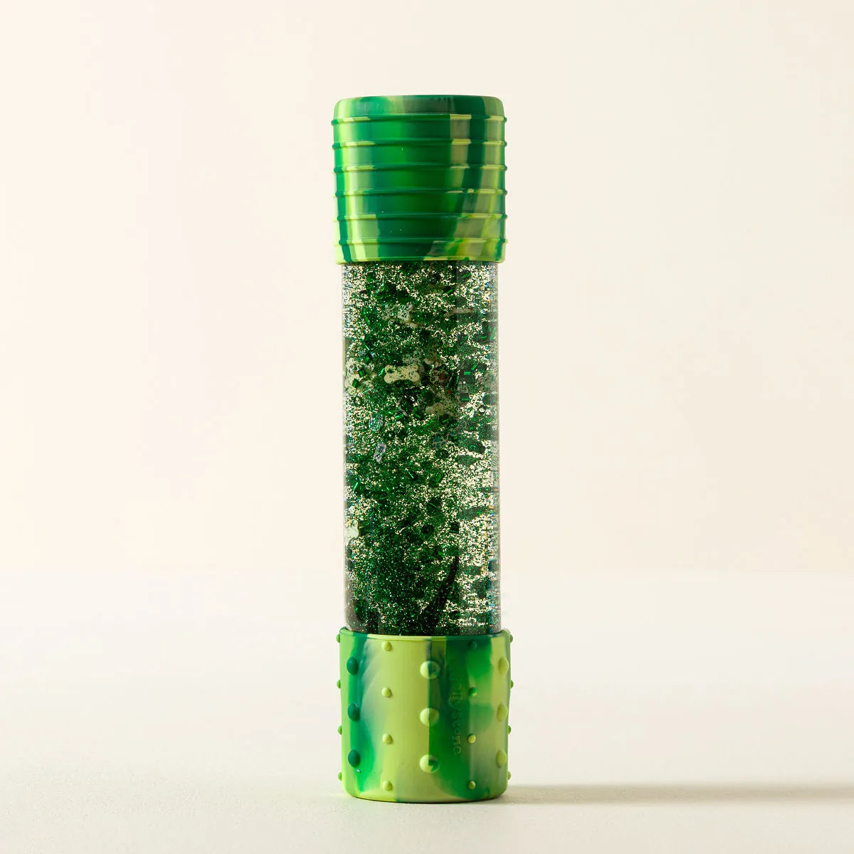DIY dinosaur sensory calm down bottle by Jellystone Designs with reusable sensory craft kit