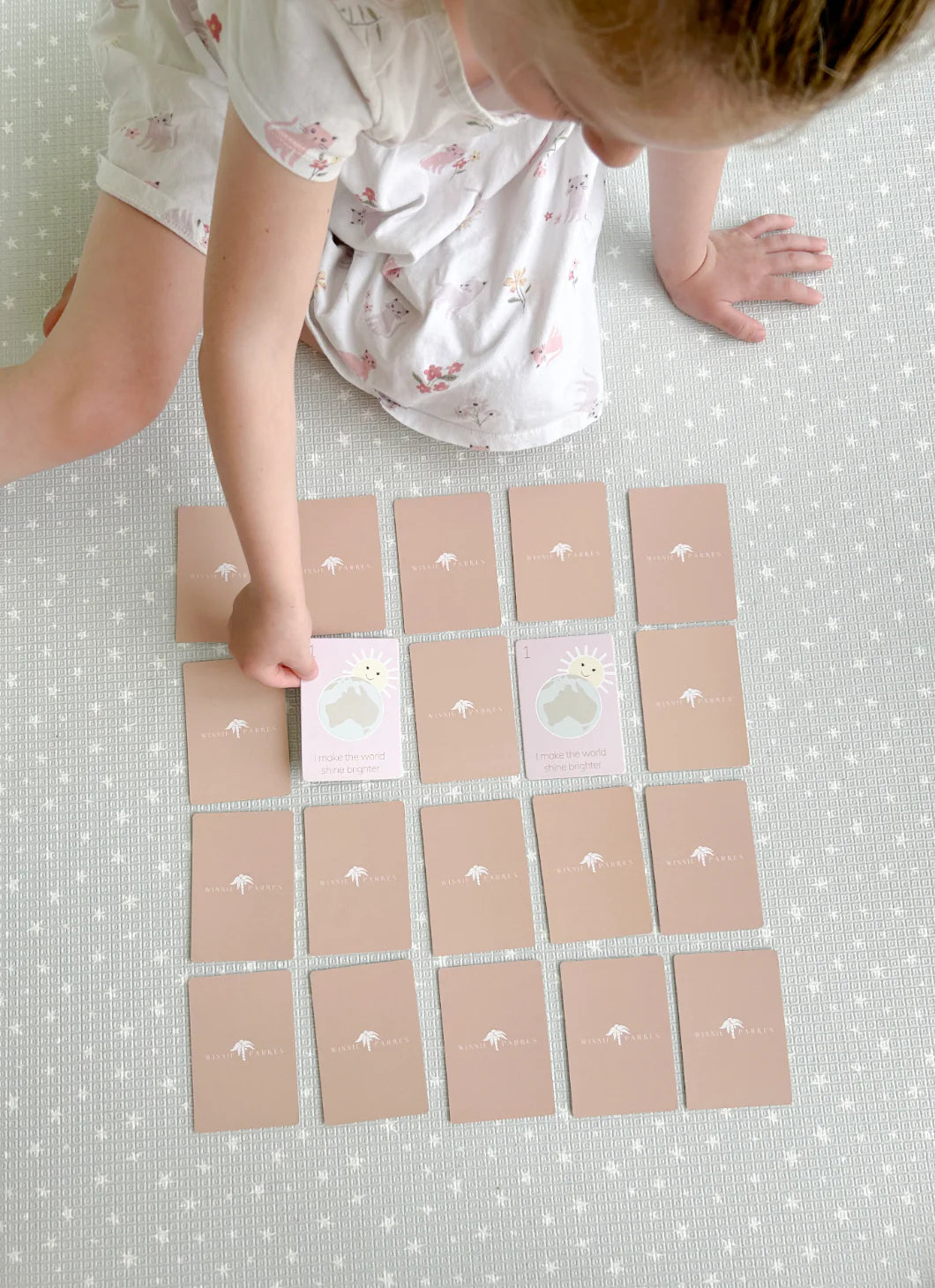 Educational memory matching card game with Australian animals and affirmations