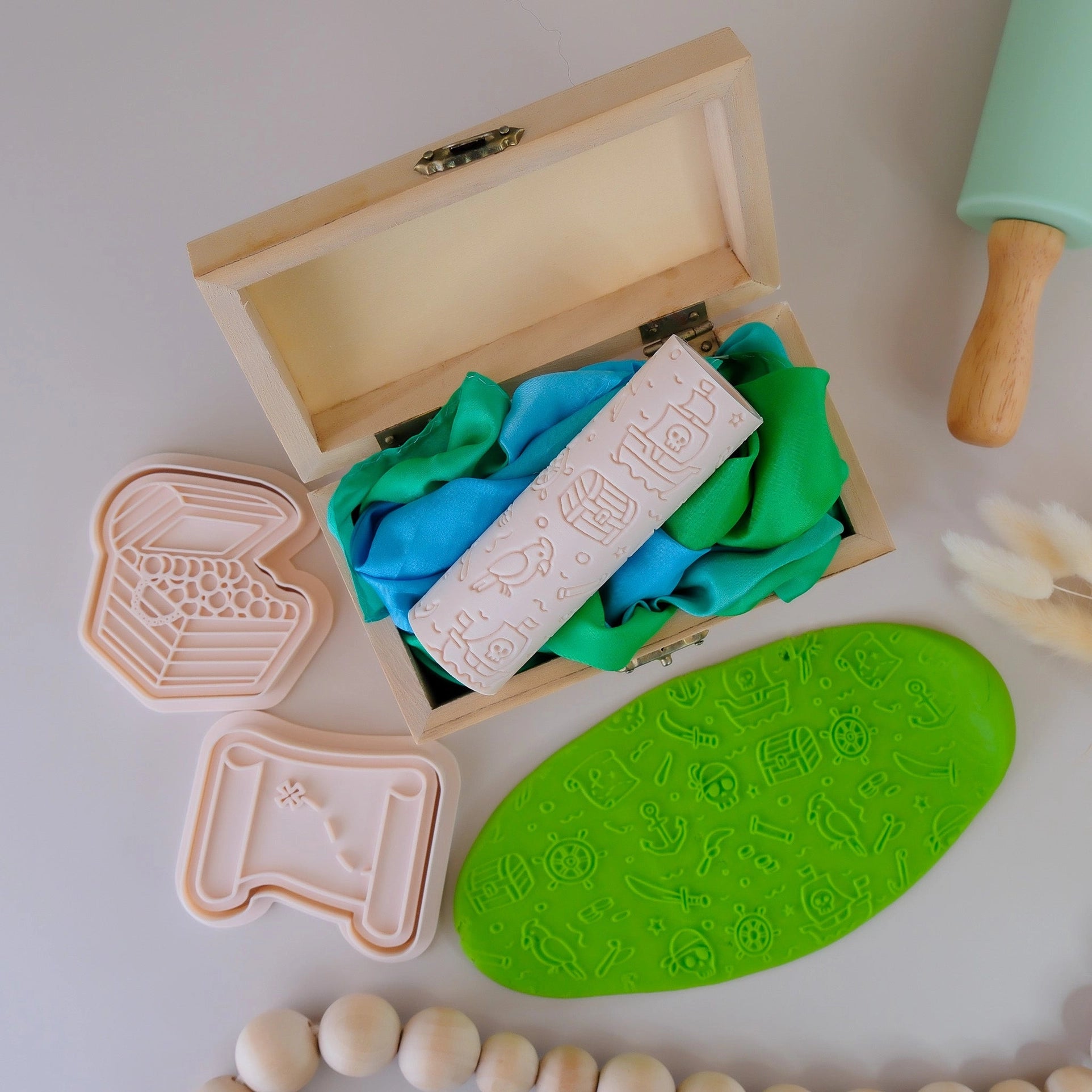 Image of eco textured dough roller designed with fun patterns and to be used with sensory like playdough or can be used for cooking dough. Textured roller is in the pattern pirate