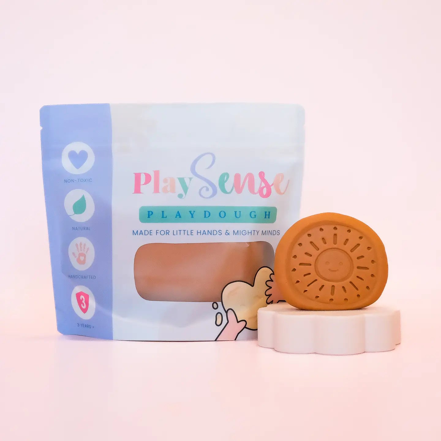 Image of dough by the brand playsense. Great for sensory play and being creative, also fine motor development. Dough is non toxic with all natural ingredients so safe for little hands. Colour and scent is rown Lamington Scented Play Sense Dough