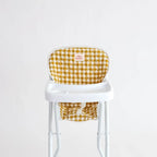 photoshoot of mustard gingham highchair for dolls made by tiny harlow