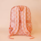 back view of straps on Fox & Fallow backpack for kids, perfect for school, daycare and everyday use. Spacious, practical and designed for little adventures. Personalisation of embroidery with name also available on bags in 2 placements. This print is peach check
