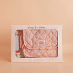 packaging of baby doll nurturer kit that is a nappy bag for kids and comes with a milk bottle and doll food for pretend play and great for gifting the print is pink ducky