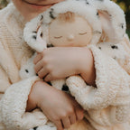 Close up spotted dog Cozy Dinkum doll face and ears