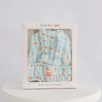 baby dolls carrier made by tiny harlow in packaging to show good for gifting and pretend play, the print is blue ducky