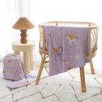 photoshoot of Fox & Fallow backpack for kids, perfect for school, daycare and everyday use. Spacious, practical and designed for little adventures. Personalisation of embroidery with name also available on bags in 2 placements. This print is unicorns,with matching blanket and pencil case