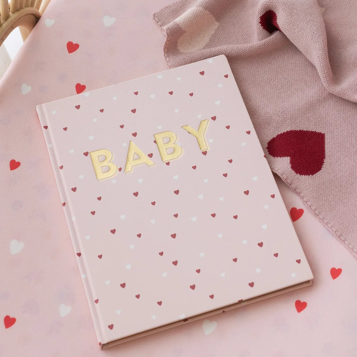 Baby keepsake book pink heart design with milestone pages and journal
