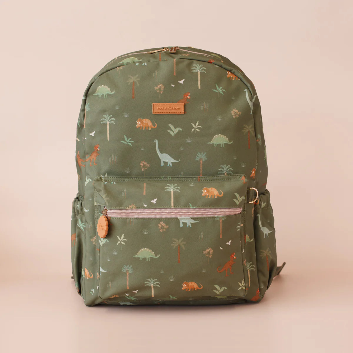 front view of Fox & Fallow backpack for kids, perfect for school, daycare and everyday use. Spacious, practical and designed for little adventures. Personalisation of embroidery with name also available on bags in 2 placements. This print is dinos